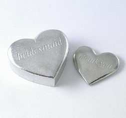 Elegant pewter box with a small heart inside to give as a gift to the ladies in the wedding party. 