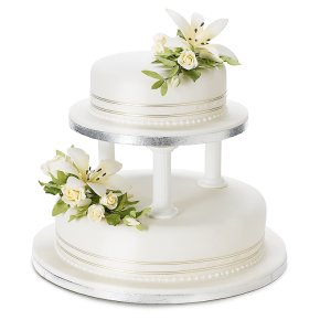 A rich fruit wedding cake covered with almond paste and soft ivory icing.