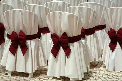 Fancy chair covers at a big budget wedding